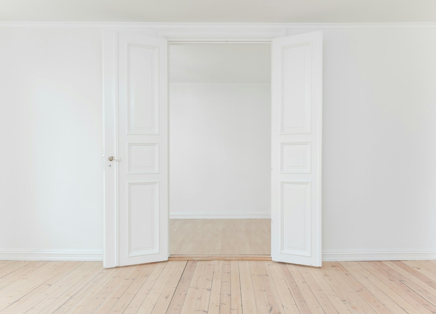 An open doorway and hallway inside a home